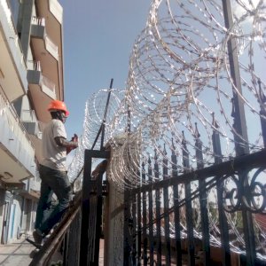 Ntinda Complex Razor wire installation by Esa Tytans Uganda